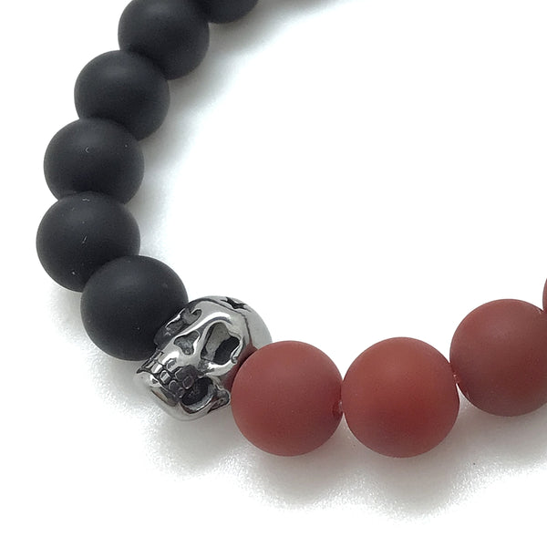 MancessoriesUSA™ Fire™ Bracelet features a stainless steel skull, matte onyx and carnelian semi-precious stones.