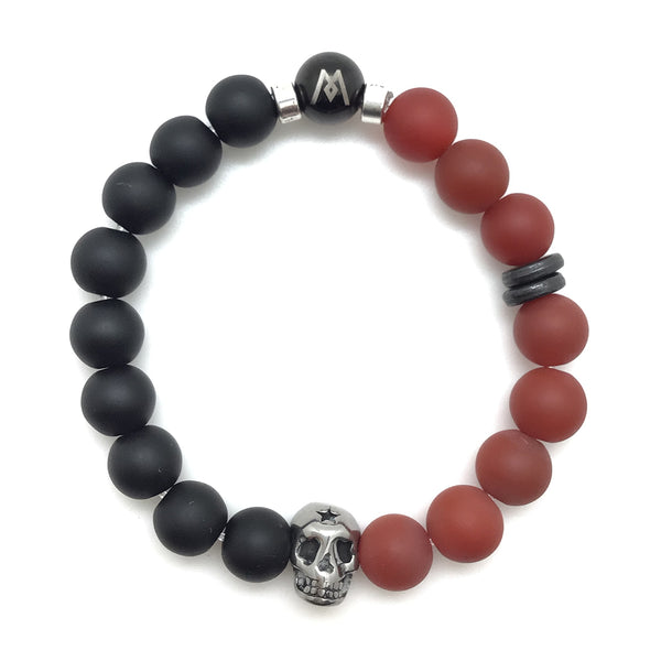 MancessoriesUSA™ Fire™ Bracelet features a stainless steel skull, matte onyx and carnelian semi-precious stones.