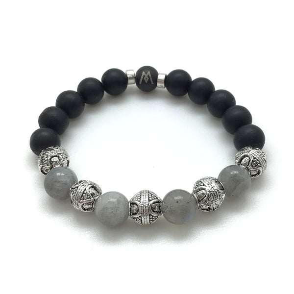 The Gray Gardens™ bracelet features AAA Grade Natural Labradorite, onyx, and silver finished Bali-style beads.
