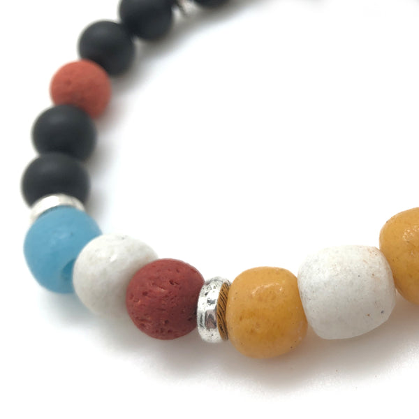 The Painted Desert Bracelet boasts African beads of sky blue, desert ochre, sand white, Sedona red and midnight black.