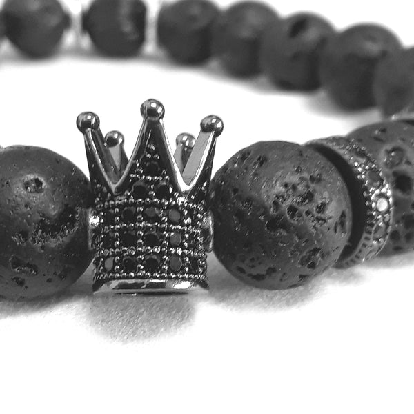 The Midnight Queen Bracelet features Black CZ pave crown surrounded by subdued black CZ pave spacers and black lava beads.
