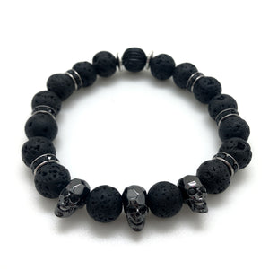 The upscale Bones Bracelet from MancessoriesUSA features three Faceted Metal Skulls with a gunmetal finish. The six accents are Genuine Swarovski® Rhodium Plated Jet (Black) Crystal Rondelles interspersed with black lava beads.