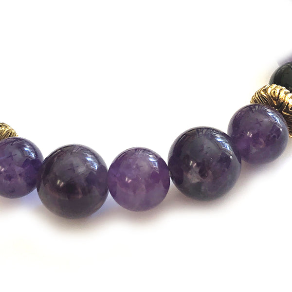 Aquarius Bracelet by MancessoriesUSA features Amethyst and Black Onyx semiprecious stones and Antique Gold Finished accents.