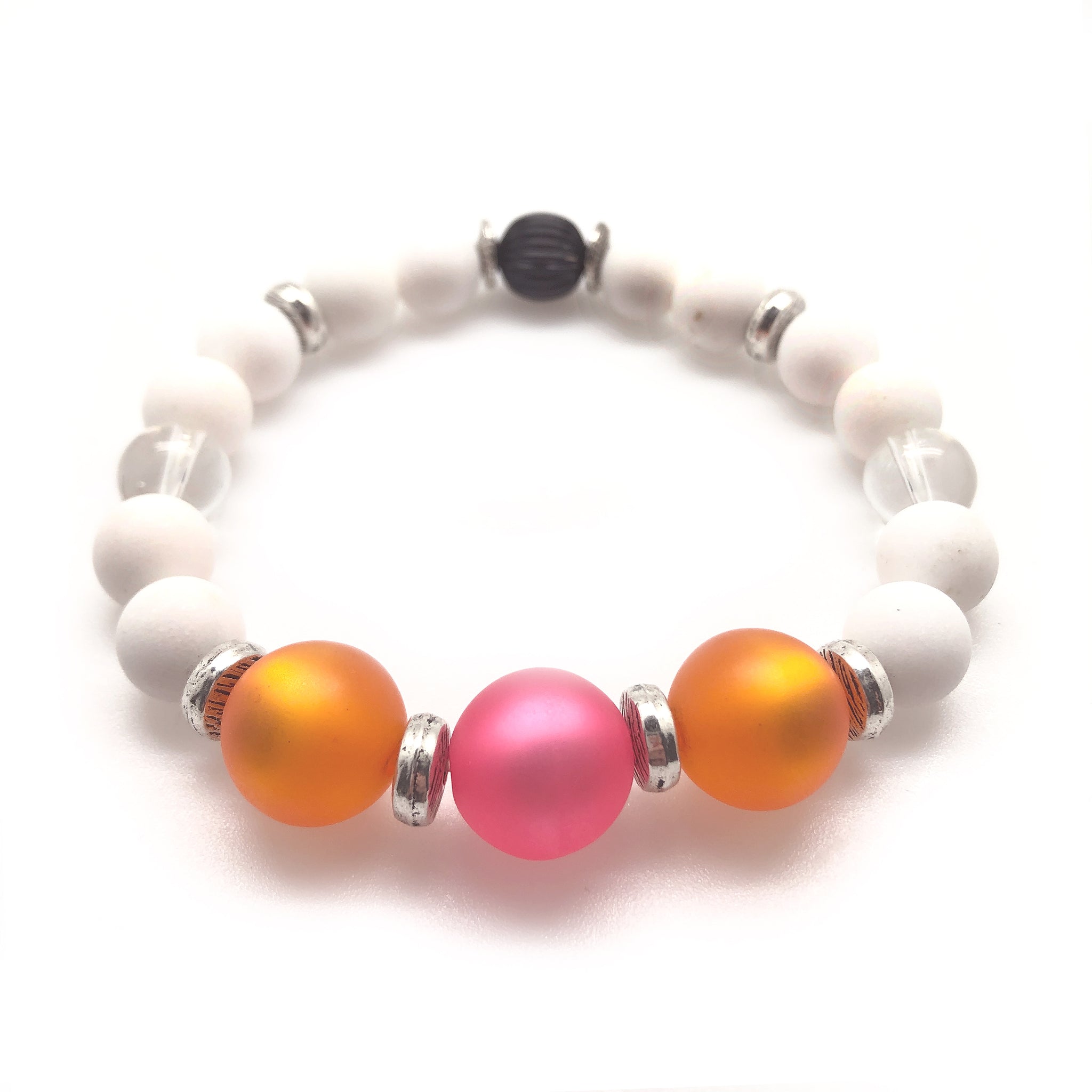 Bliss Bracelet features pink and orange German resin beads surrounded by white matte agate semi-precious stones and gloss clear glass beads.
