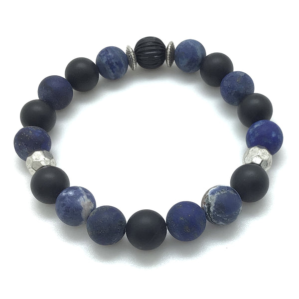The Lapiz Lazuli, Black Onyx, and Dark Blue Sodalite of the Deep Blue Sea™ Bracelet by MancessoriesUSA™ captures the ocean's intrigue.