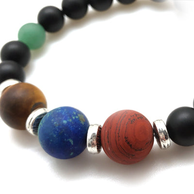 The MancessoriesUSA Glactic Bracelet is one-of-a-kind and features Tiger Eye, Lapiz Lasuli, Jasper. and Black Onyx.