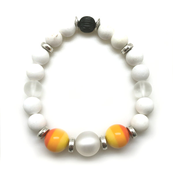 The MancessoriesUSA Sunshine Bracelet features Red-Orange-Yellow banded Italian Polyester and a translucent German Resin beads. 