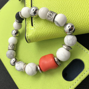 MancessooriesUSA Verano Bracelet features orange coral, white howlite and stainless steel beads.